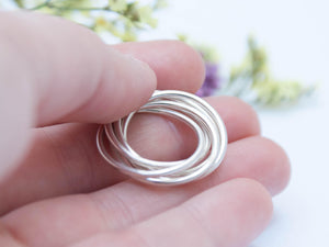 Anell de meditació fidget de plata, anell d'ansietat, anells de casament entrellaçats, entrellaçats